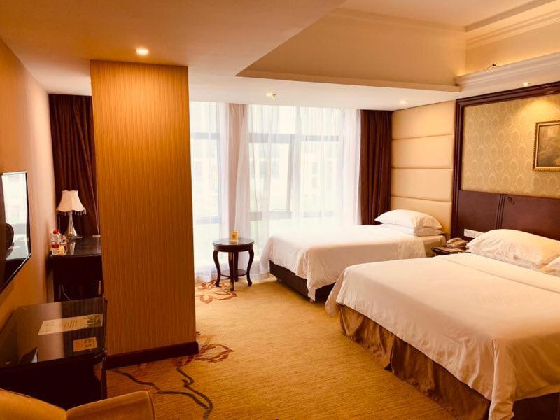Vienna Hotel Shanghai Happy Valley Songjiang Bagian luar foto